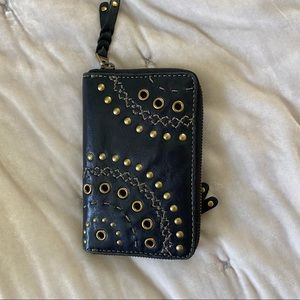 Fossil black leather zip open wallet studs and grommets